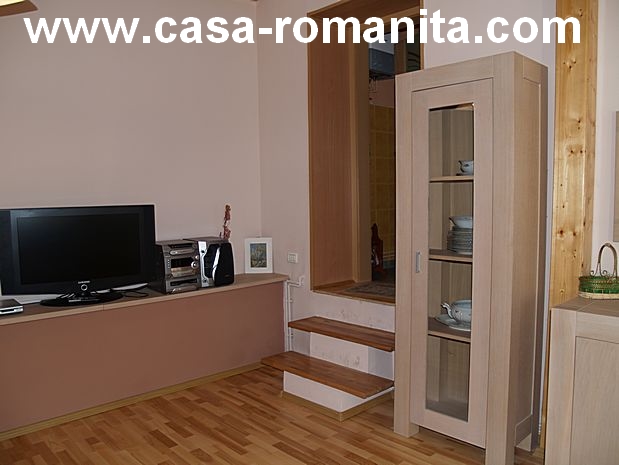  Lakószoba a brassói Casa Romanita Nyaralóházban, nyaralóház a román Kárpátokban